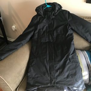 North face mid thigh jacket. Longer in back.